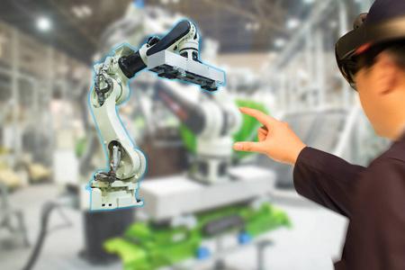 智能工厂使用自动化机器人手臂照片
